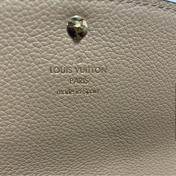Authentic Louis Vuitton Emilie Monogram Empreinte Leather Wallet in black - Picture 8 of 9